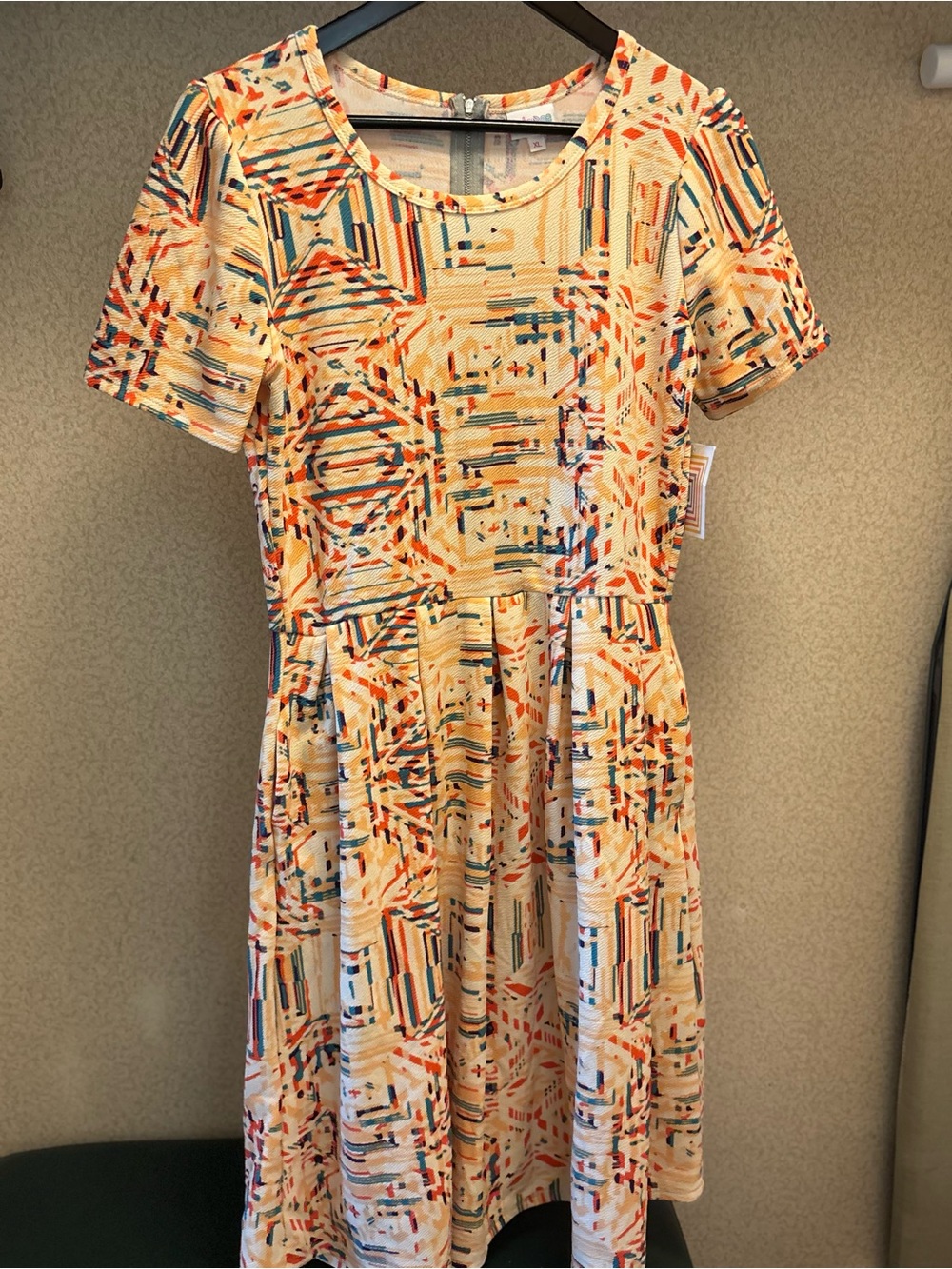 LuLaRoe Cream Midi Dress with Orange and Blue Geometric Print